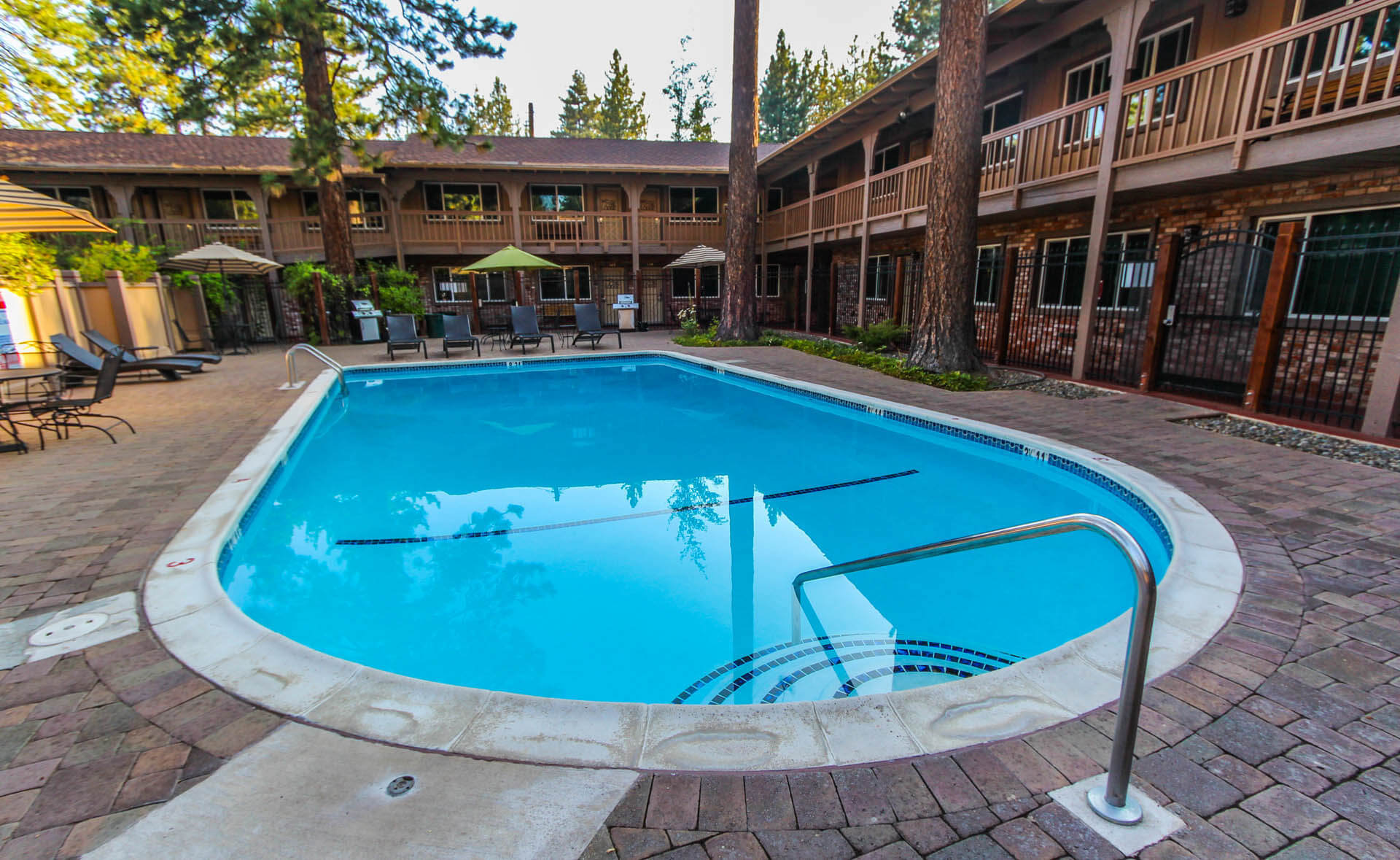 A crisp outdoor swimming pool at VRI's The Lodge at Lake Tahoe in California.